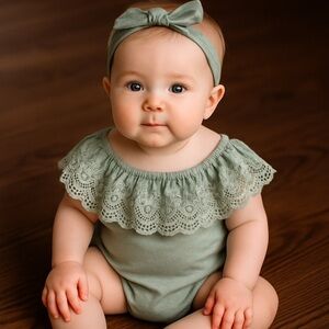 Bailey’s Blossoms mint green onesie with soft lace collar/bottom snaps. Sz 2